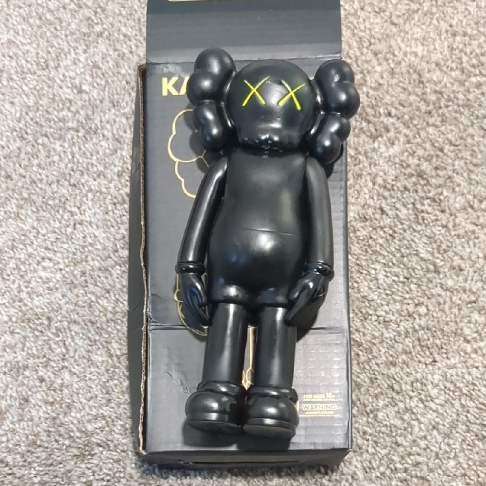 Black and Yellow Kids Toy Figure
